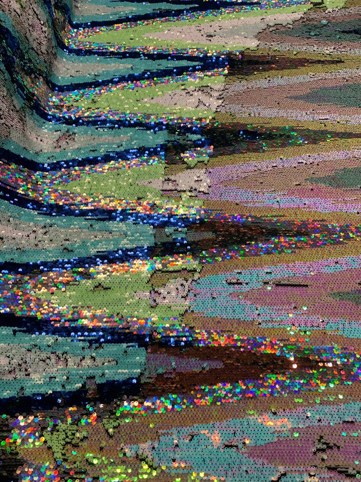 ZIGZAG modern iridescent reversible sequins multicolor on Lycra base 2way 55/57" Sold by the YD. Ships worldwide from Los Angeles CA.