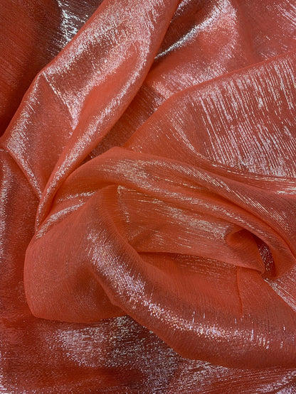 Silk metallic chiffon coral/silver 2way Stretch 44/45" Sold by the YD. Ships worldwide from Los Ángeles California USA.