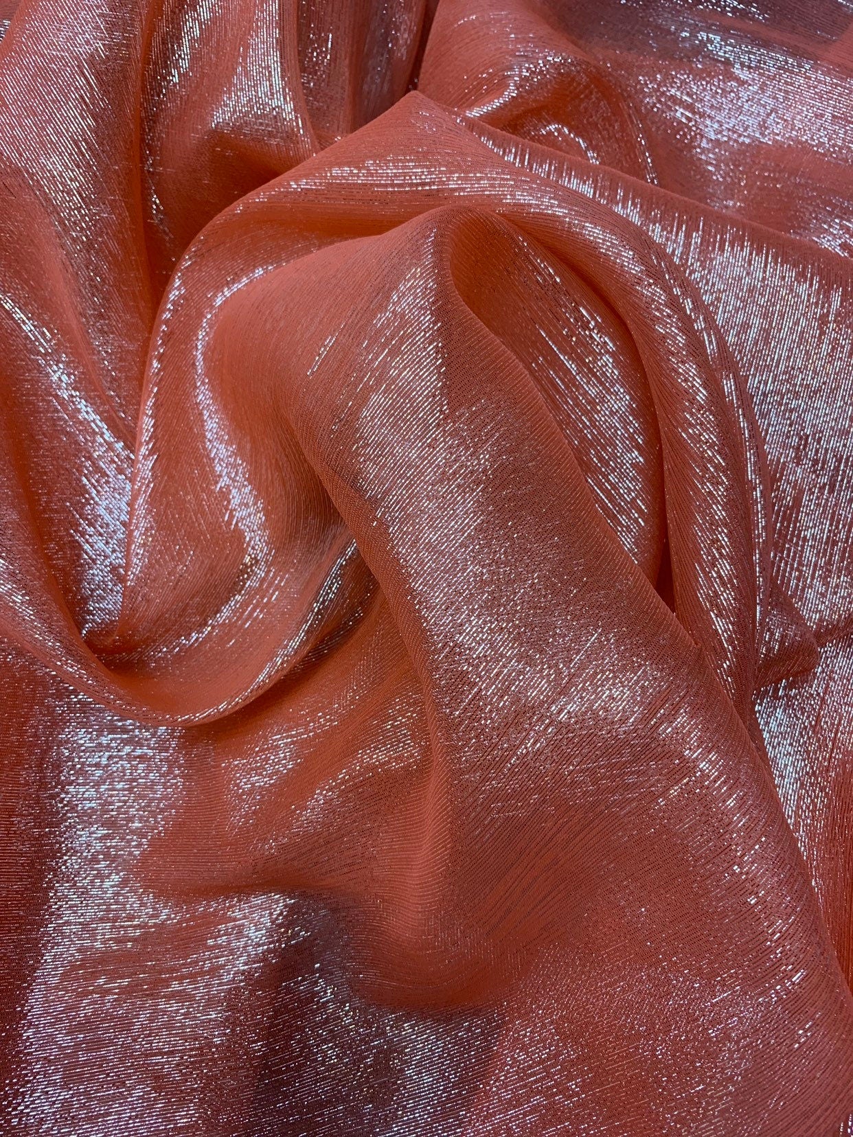 Silk metallic chiffon coral/silver 2way Stretch 44/45" Sold by the YD. Ships worldwide from Los Ángeles California USA.