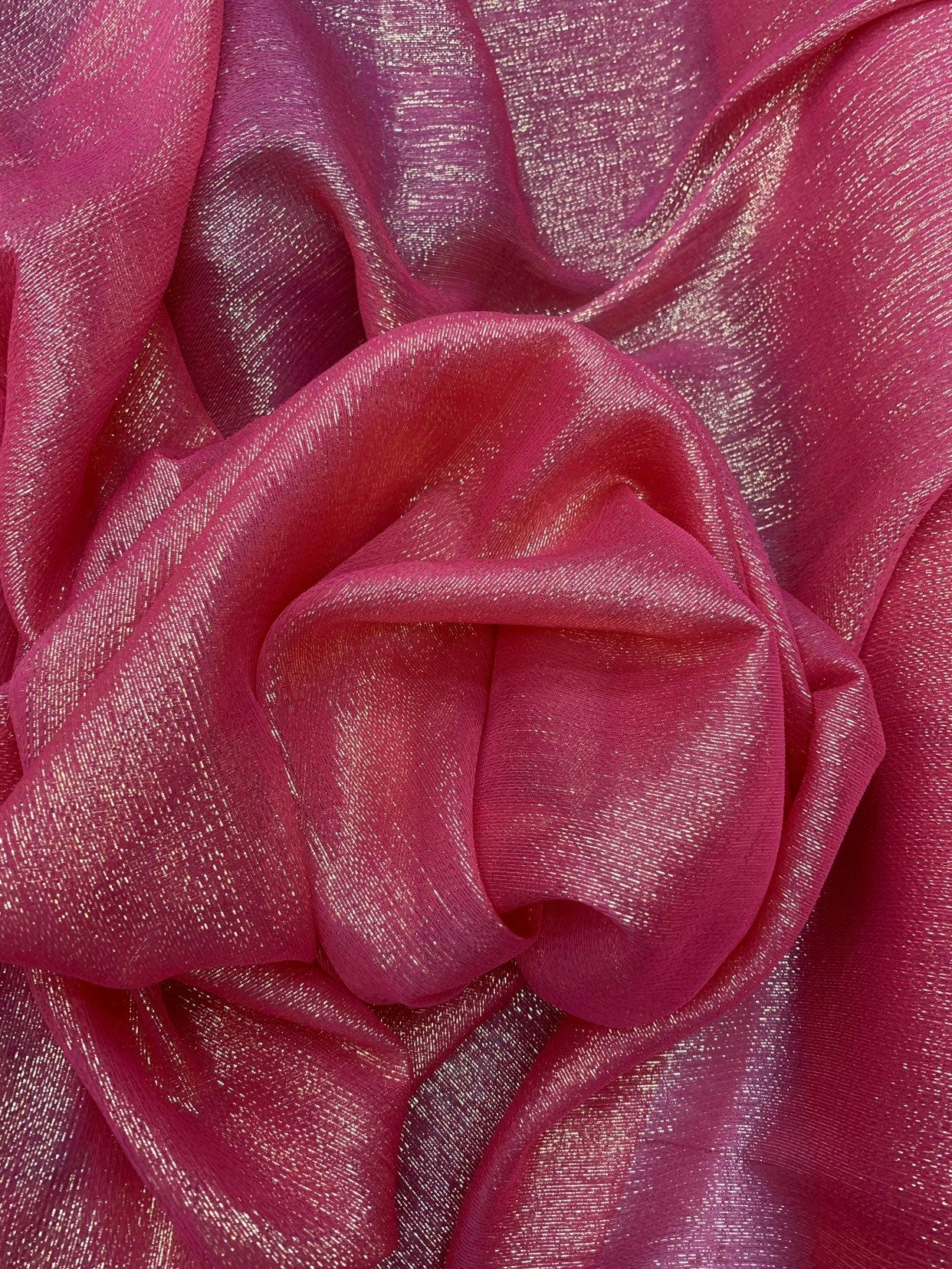 Silk metallic chiffon hot pink/silver gold  2way Stretch 44/45" Sold by the YD. Ships worldwide from Los Ángeles California USA.