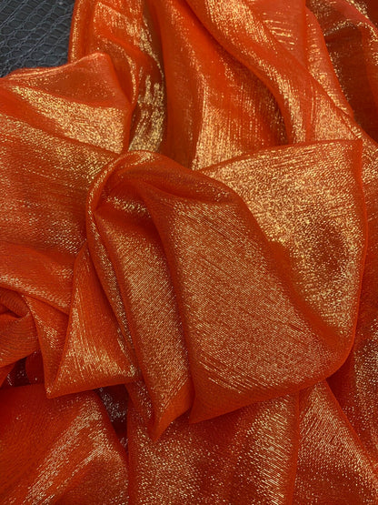 Silk metallic chiffon orange/gold 2way Stretch 44/45" Sold by the YD. Ships worldwide from Los Ángeles California USA.