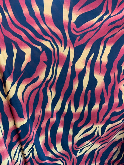 New tiger design print on medium weight spandex 4way stretch 58/60" Sold by the YD. Ships worldwide from Los Angeles California USA.