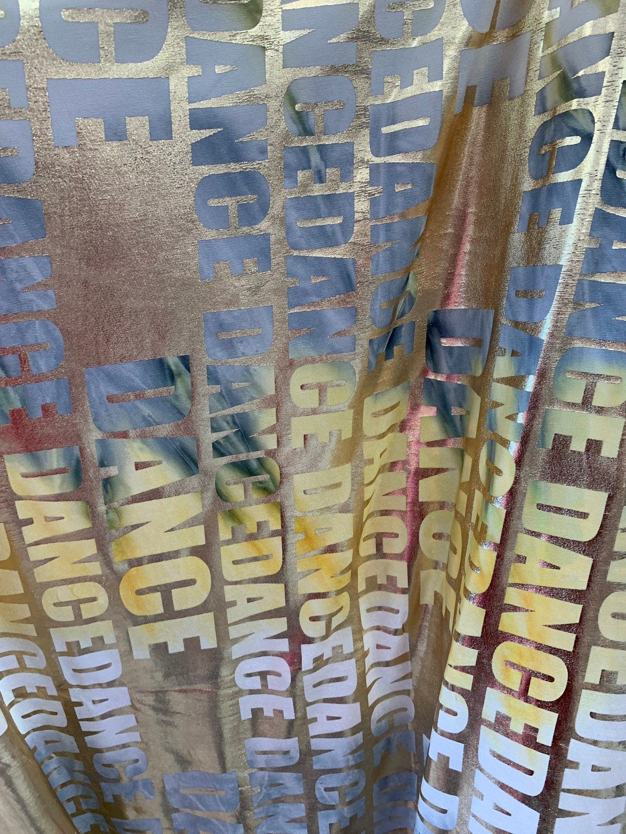 New all over foil tie dye dance design Metallic nylon spandex 4way stretch 58/60" Sold by the YD. Ships worldwide from Los Angeles CA USA.