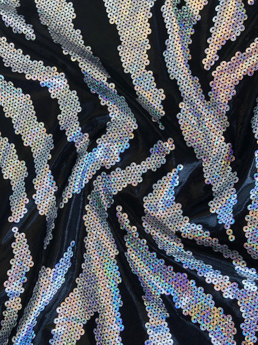 New metallic nylon spandex sequins zebra looking with foggy foil all over 4way stretch 58/60" Sold by the YD. Ships worldwide from L.A CA