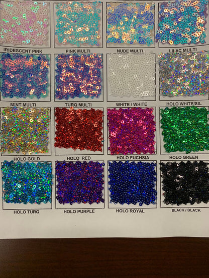 New Disney sequins cosmic iridescent mini glitz sequins embroidered on stretch power mesh 4-Way 55/56" Sold by the YD. Ships worldwide