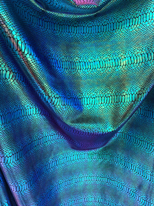 New Iridescent snake foil 2 tone blue/green metallic nylon spandex 4way stretch 58/60" Sold by the  YD. Ships worldwide from Los Angeles CA.