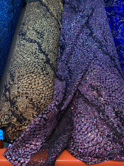 New power mesh with glitter snake design 4-Way stretch 58/60" Sold by the YD. Ships worldwide from Los Angeles California USA.