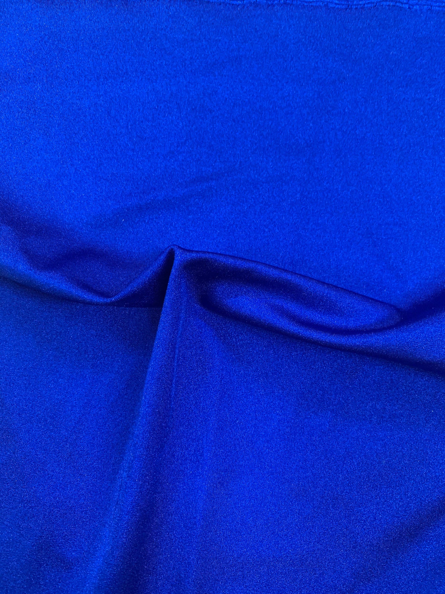 Shining tricot Sapphire Blue nylon spandex 4way stretch 58/60" Sold by the YD. Ships worldwide from Los Angeles California USA.