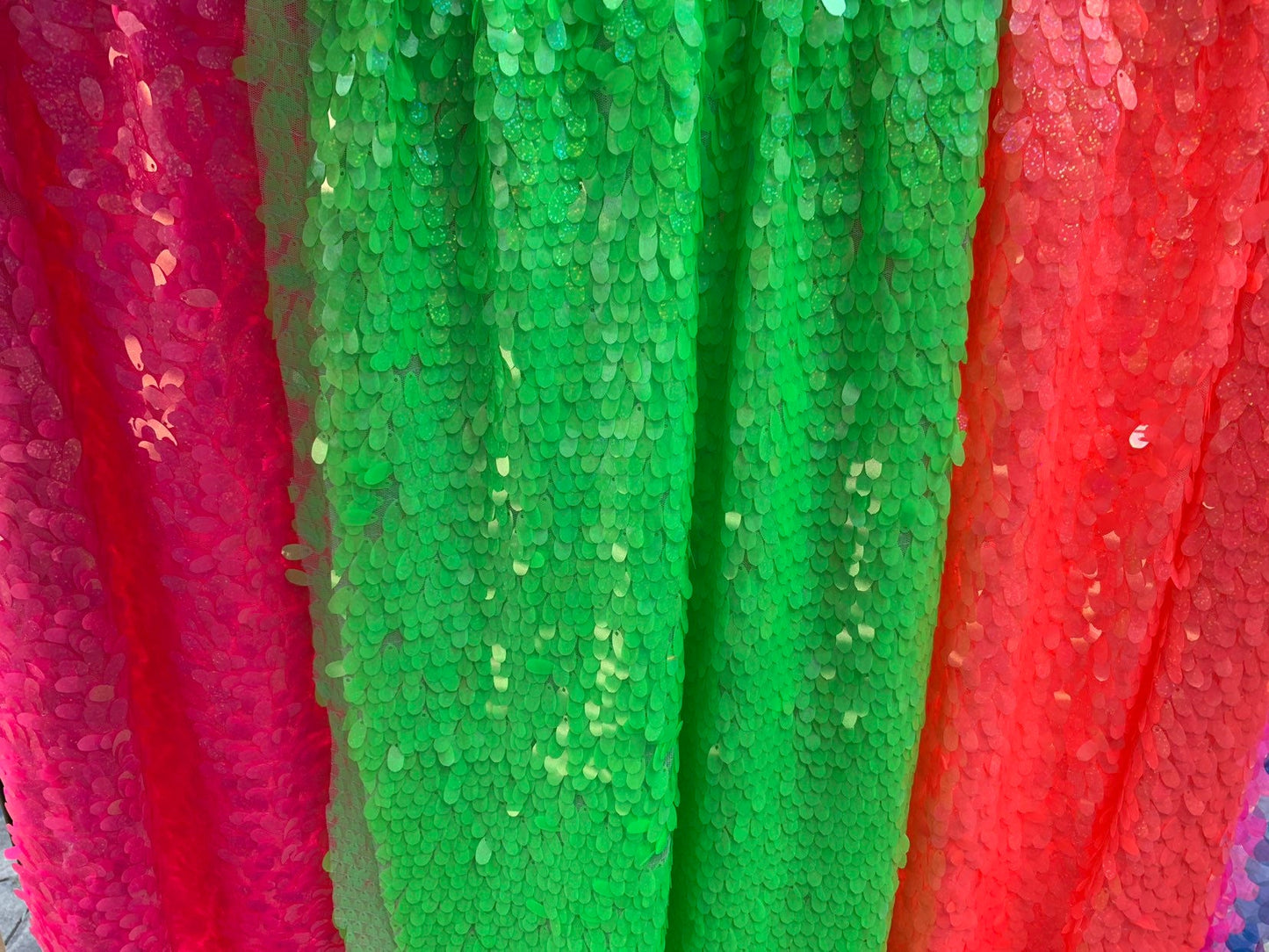 New teardrops sequins medium size neon colors shining sequins on stretch mesh 55/57" Sold by the YD. Ships worldwide from Los Angeles CA USA