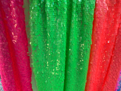 New teardrops sequins medium size neon colors shining sequins on stretch mesh 55/57" Sold by the YD. Ships worldwide from Los Angeles CA USA