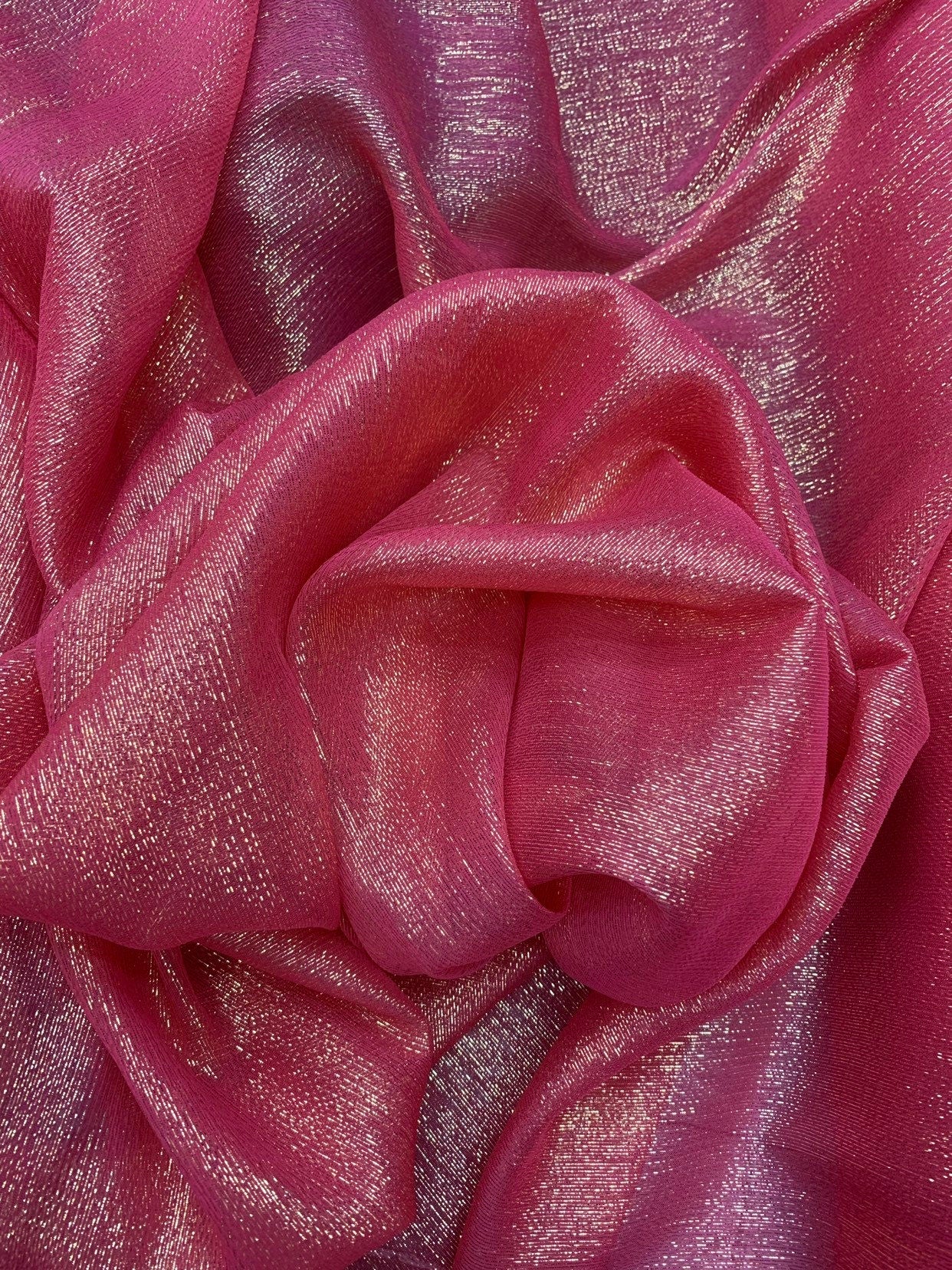 Silk metallic chiffon hot pink/silver gold  2way Stretch 44/45" Sold by the YD. Ships worldwide from Los Ángeles California USA.