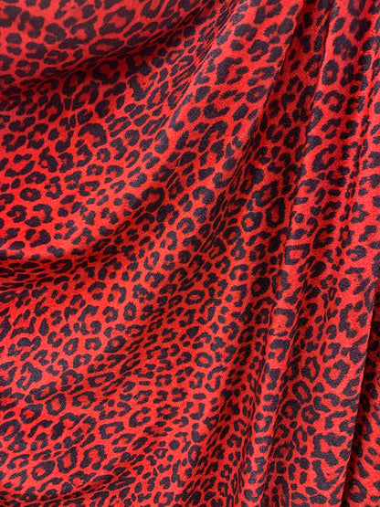 Leopard print on heavy stretch velvet 420 grams 4 way stretch 58/60" Sold by the YD. Ships worldwide from Los Angeles California USA.