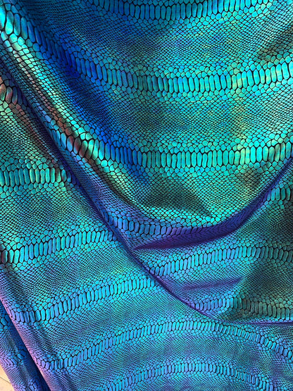 New Iridescent snake foil 2 tone blue/green metallic nylon spandex 4way stretch 58/60" Sold by the  YD. Ships worldwide from Los Angeles CA.