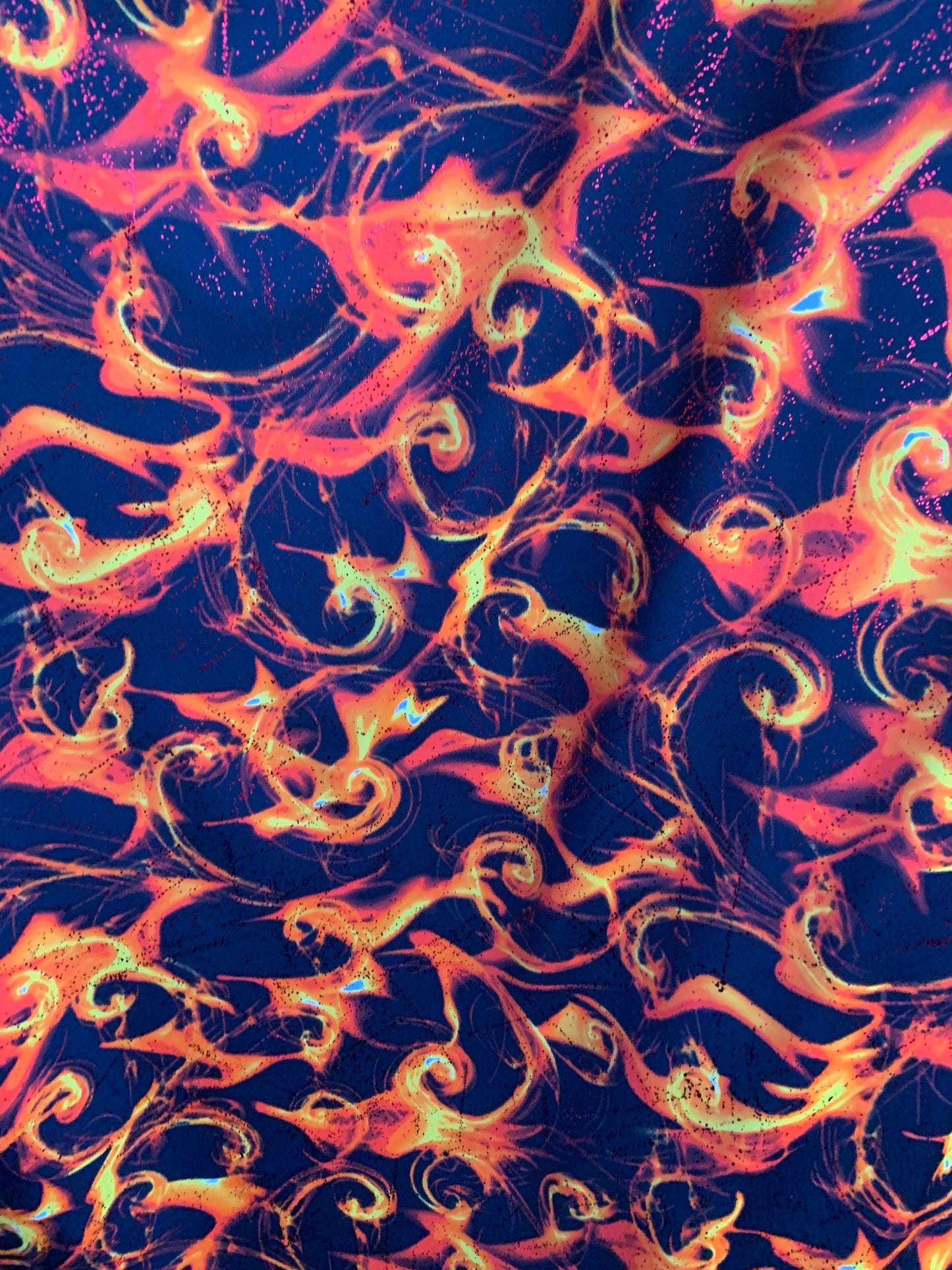 New tornado fire design with foggy foil heavy nylon spandex 4way stretch 58/60" Sold by the YD. Ships worldwide from Los Angeles California.