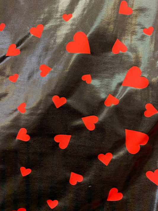 New metallic nylon spandex heart design Black/red all over foil 4-way stretch 58/60” Sold by the YD. Ships worldwide from Los Angeles CA USA