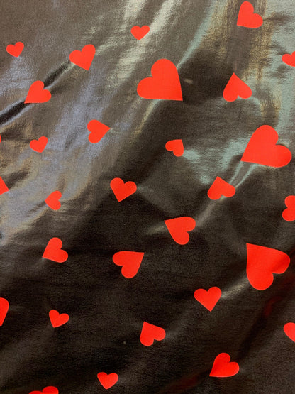 New metallic nylon spandex heart design Black/red all over foil 4-way stretch 58/60” Sold by the YD. Ships worldwide from Los Angeles CA USA