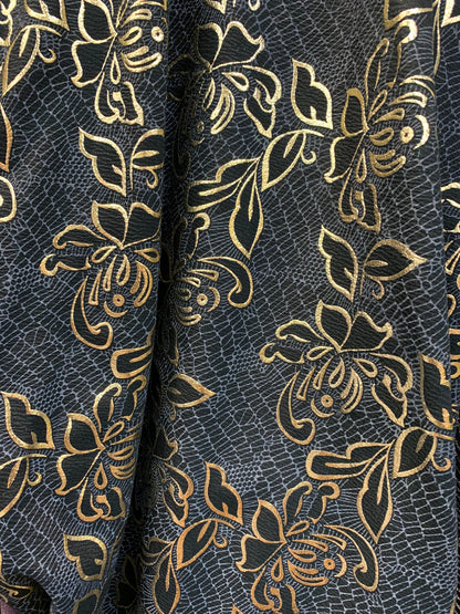 New metallic poly spandex flower design Black/gold 2-way stretch 58/60” Sold by the YD. Ships worldwide from Los Angeles California USA.