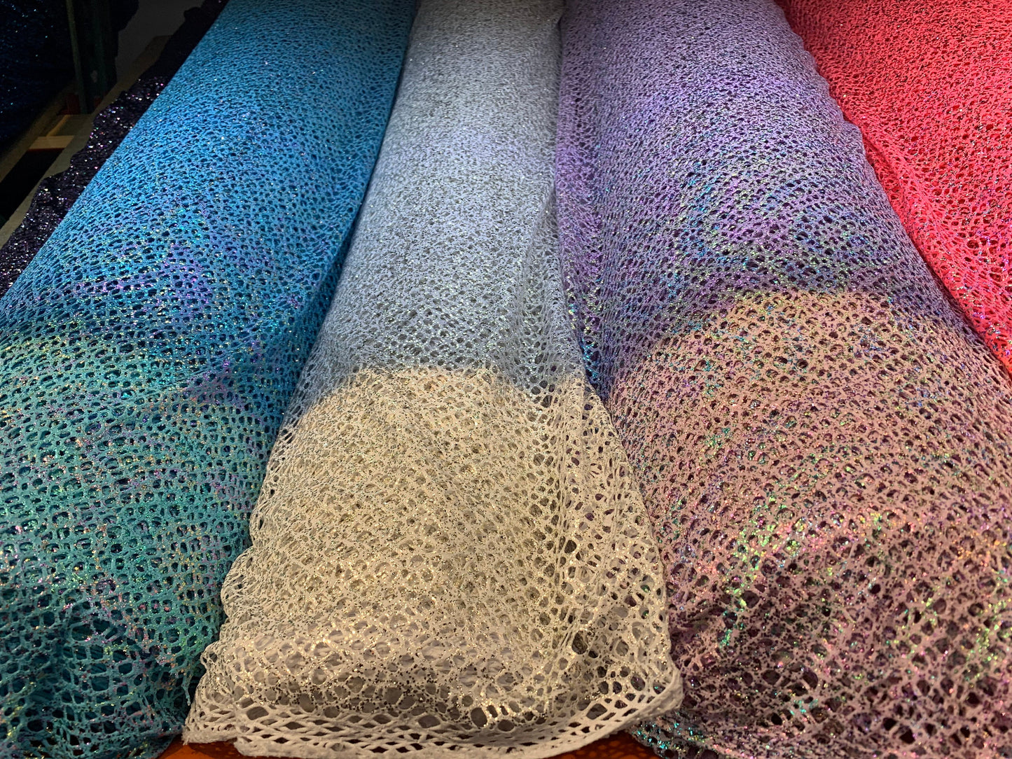 New fishnet with metallic glitter all over 4-way Stretch 58/60” Sold by the YD. Ships worldwide from Los Angeles California USA.