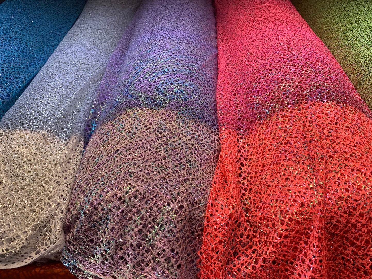 New fishnet with metallic glitter all over 4-way Stretch 58/60” Sold by the YD. Ships worldwide from Los Angeles California USA.