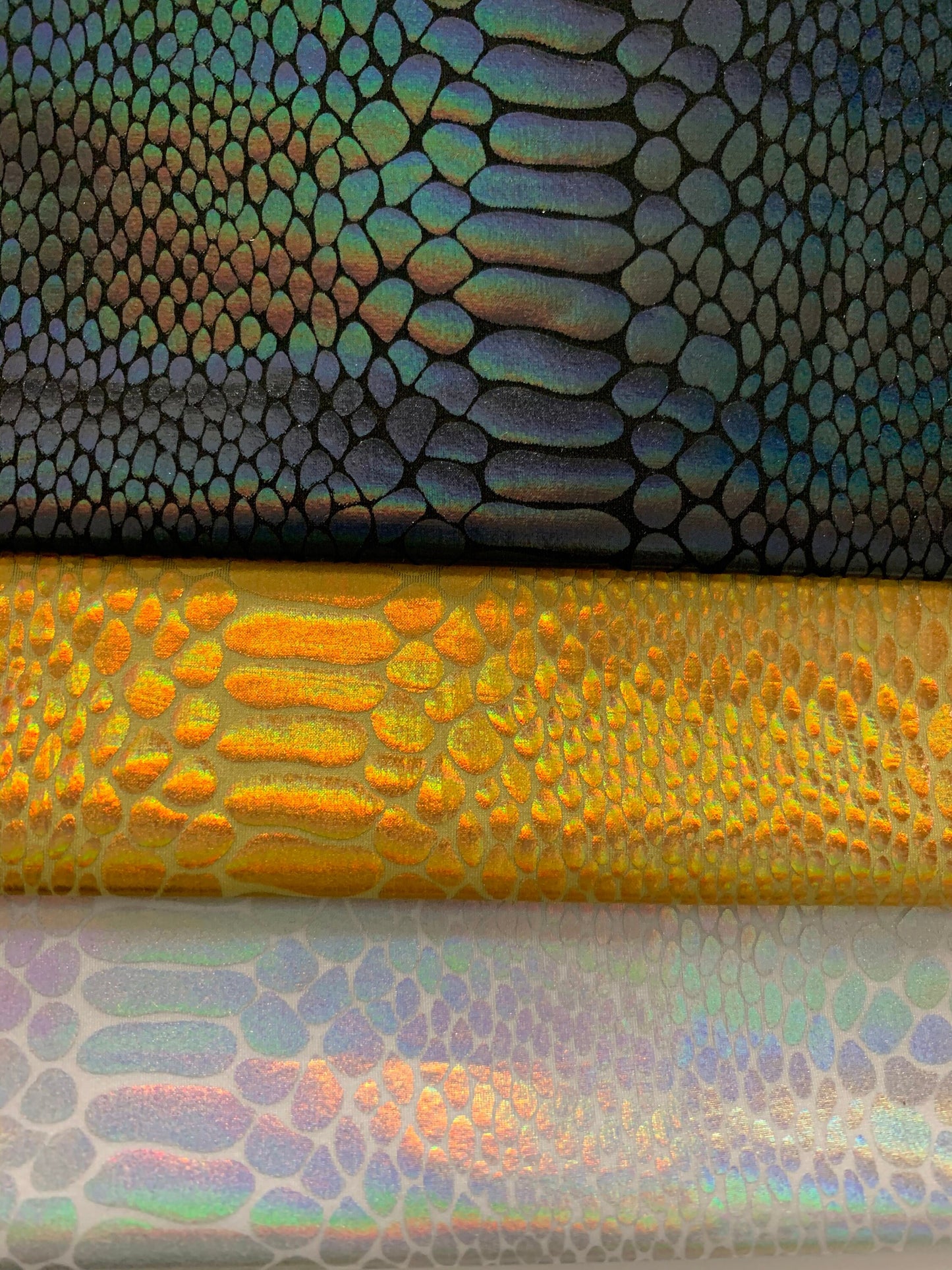 New Iridescent Serpent Design Hologram Metallic Nylon Spandex 4-Way Stretch 58/60" Sold By The YD. Ships Worldwide From Los Angeles C.A USA.