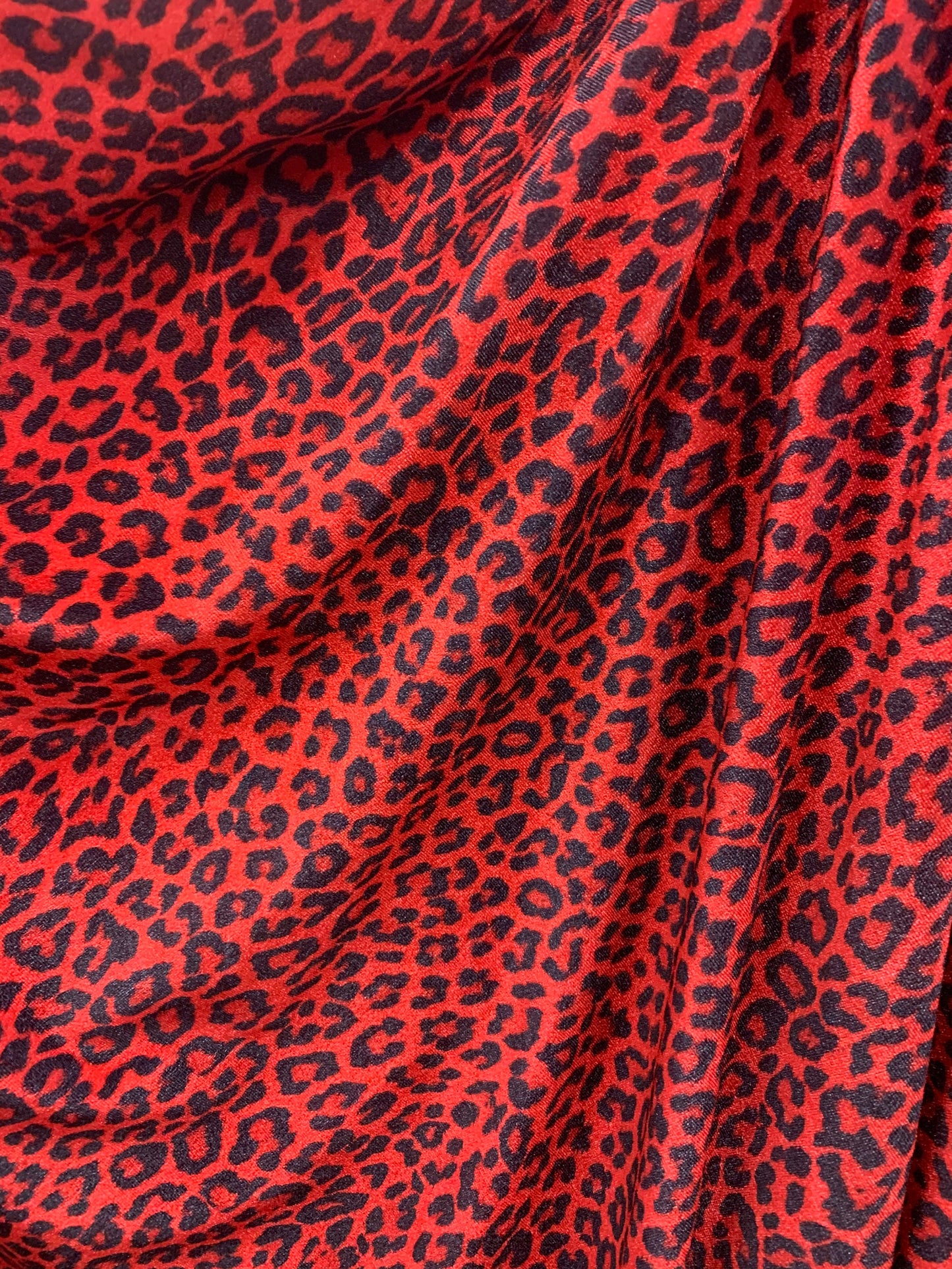 Leopard print on heavy stretch velvet 420 grams 4 way stretch 58/60" Sold by the YD. Ships worldwide from Los Angeles California USA.