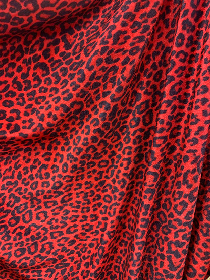 Leopard print on heavy stretch velvet 420 grams 4 way stretch 58/60" Sold by the YD. Ships worldwide from Los Angeles California USA.