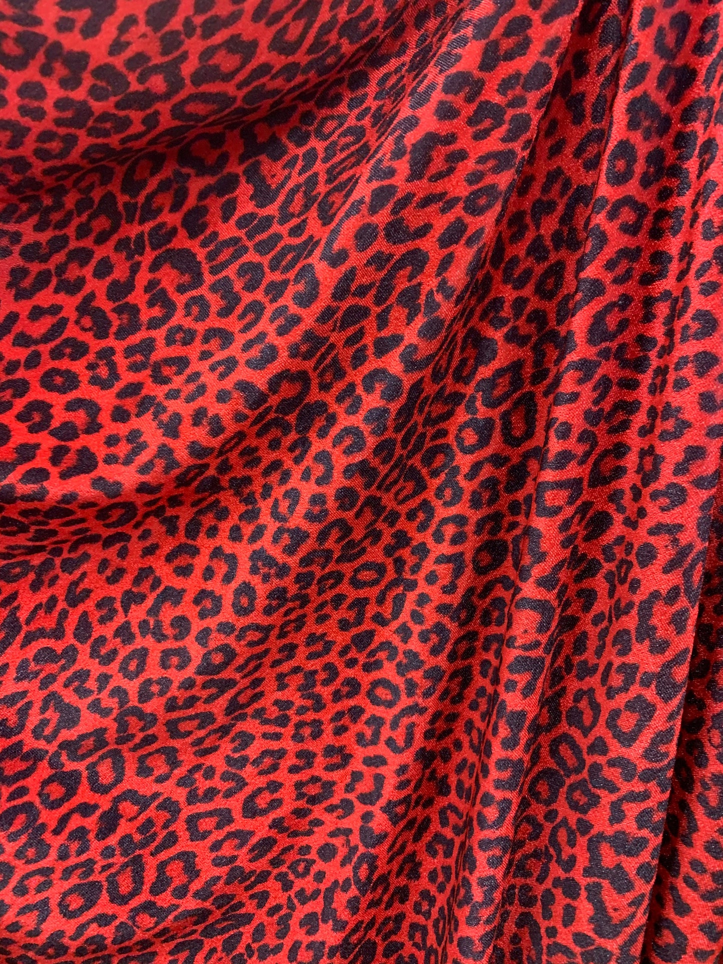 Leopard print on heavy stretch velvet 420 grams 4 way stretch 58/60" Sold by the YD. Ships worldwide from Los Angeles California USA.