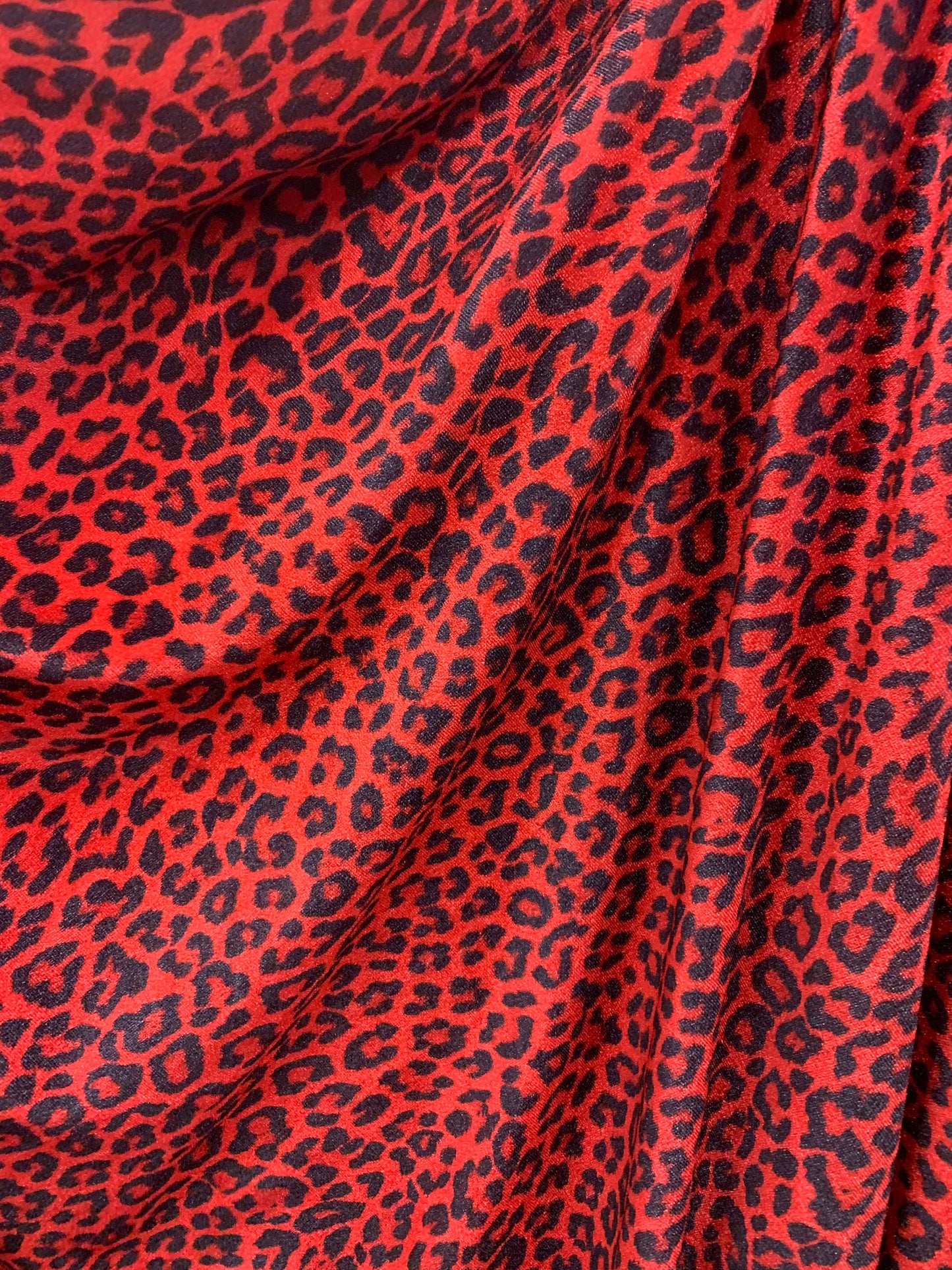 Leopard print on heavy stretch velvet 420 grams 4 way stretch 58/60" Sold by the YD. Ships worldwide from Los Angeles California USA.