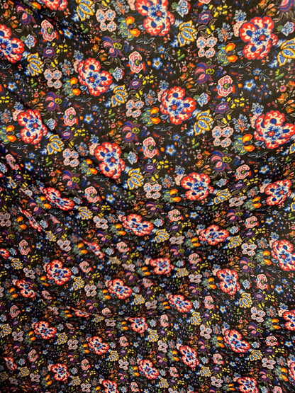 New multi flower design black/multicolor print nylon spandex 4-way stretch 58/60” Sold by the YD. Ships worldwide from Los Angeles CA USA.