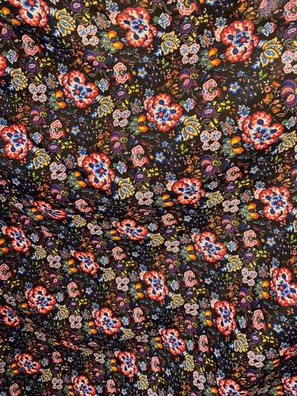 New multi flower design black/multicolor print nylon spandex 4-way stretch 58/60” Sold by the YD. Ships worldwide from Los Angeles CA USA.