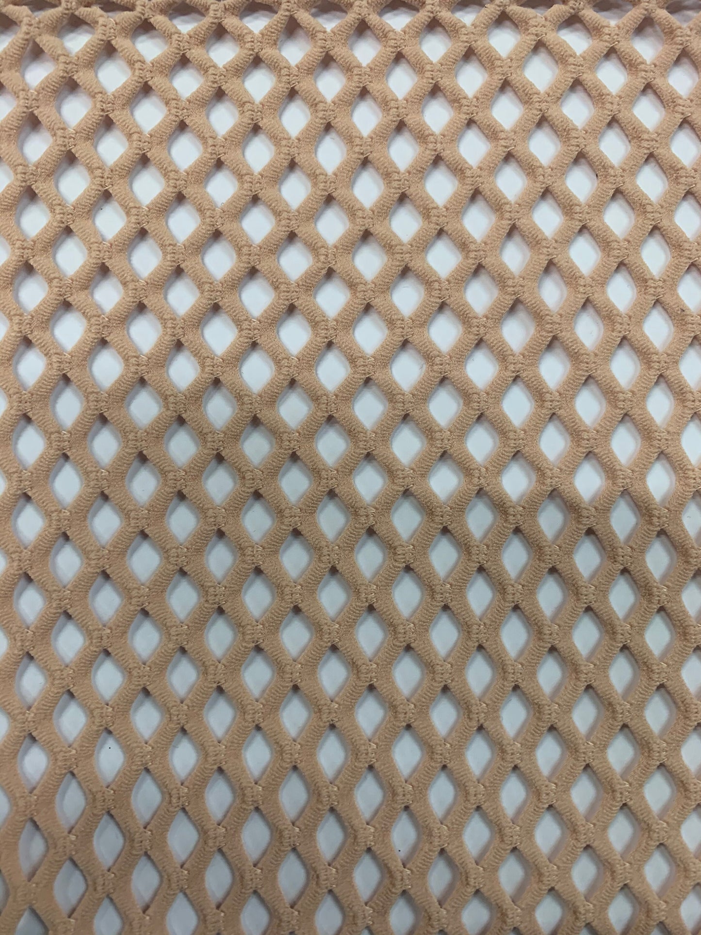 Fishnet Diamond mesh nylon spandex 4way stretch 58/60" Sold by the YD. Ships worldwide from Los Angeles California USA.