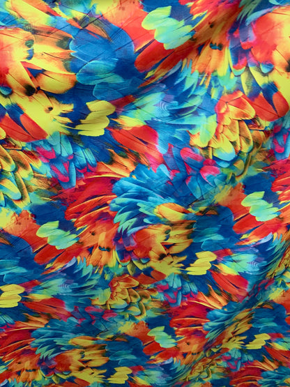 Feathers design print on nylon spandex with clear foil 4way Stretch 58/60" Sold by the YD. Ships worldwide from Los Angeles California USA