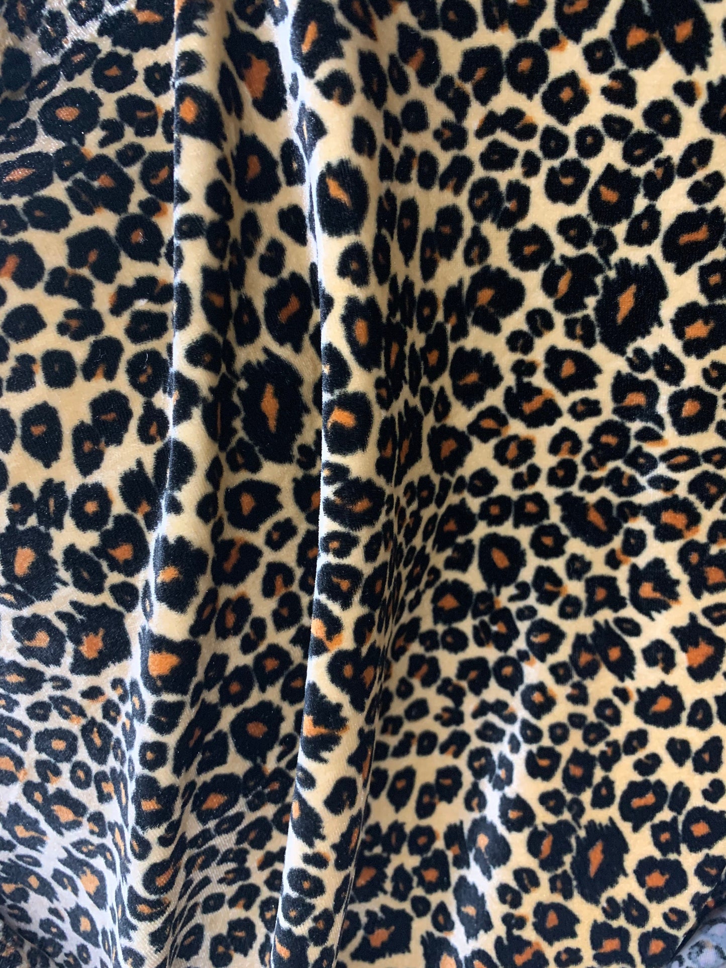 New premier exotic Leopard design print on stretch velvet 4-way 58/60" Sold By The YD. Ships worldwide from Los Angeles California USA.