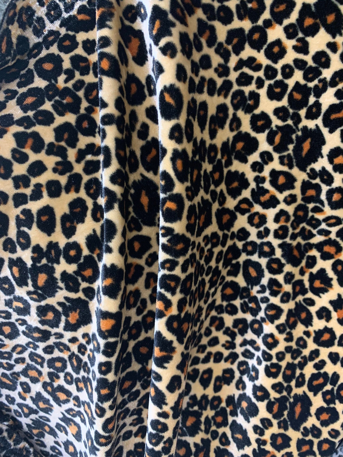 New premier exotic Leopard design print on stretch velvet 4-way 58/60" Sold By The YD. Ships worldwide from Los Angeles California USA.