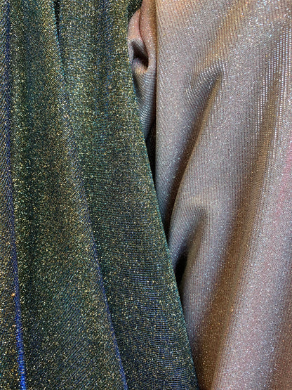 New lame metallic spandex with glitter 2-way stretch 58/60” Sold by the YD. Ships worldwide from Los Angeles California USA.