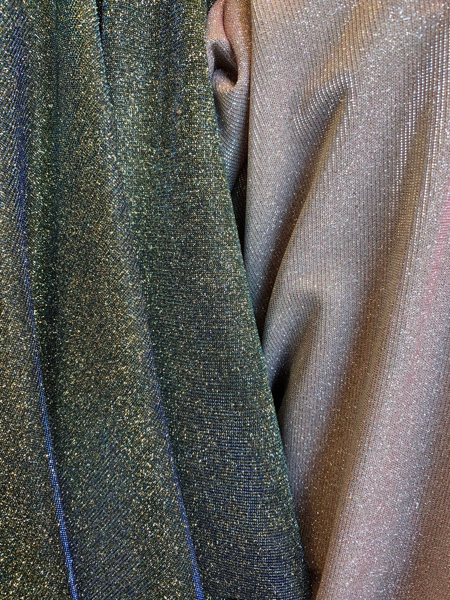 New lame metallic spandex with glitter 2-way stretch 58/60” Sold by the YD. Ships worldwide from Los Angeles California USA.