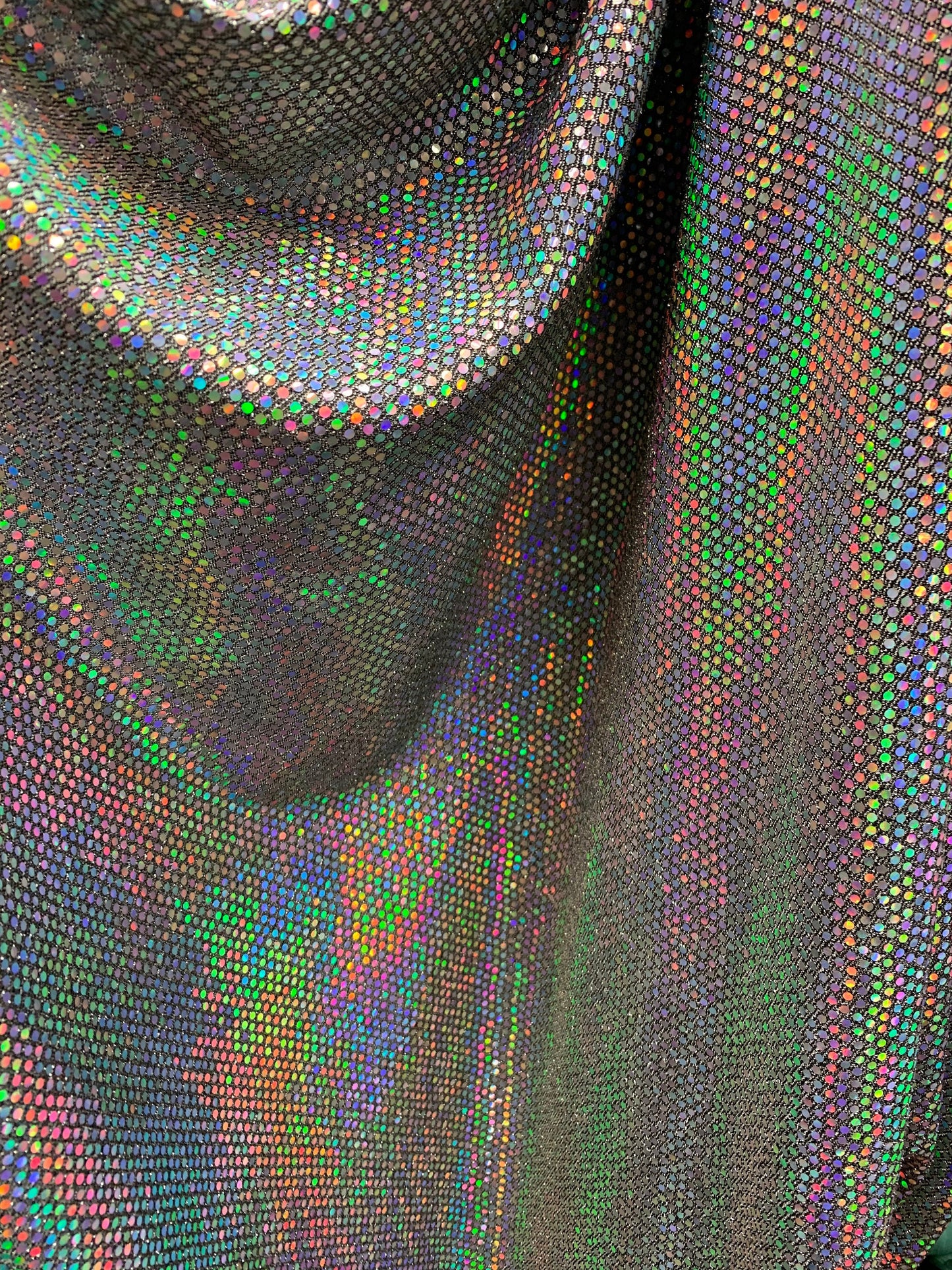 New metallic fabric with iridescent mini sequins all over 2-way Stretch 58/60” Sold by the YD. Ships worldwide from Los Angeles California.