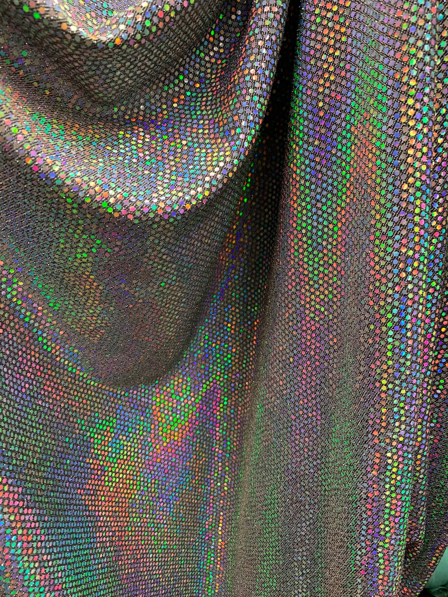 New metallic fabric with iridescent mini sequins all over 2-way Stretch 58/60” Sold by the YD. Ships worldwide from Los Angeles California.