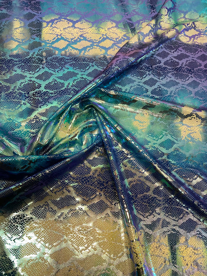 New tie dye exotic snake design metallic hologram nylon spandex with foil 4-way 58/60” Sold by the YD. Ships worldwide from Los Angeles CA.