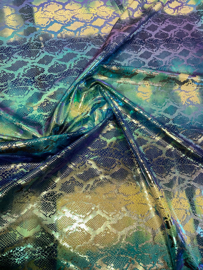 New tie dye exotic snake design metallic hologram nylon spandex with foil 4-way 58/60” Sold by the YD. Ships worldwide from Los Angeles CA.