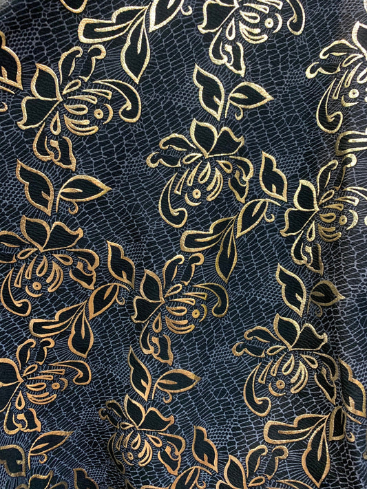 New metallic poly spandex flower design Black/gold 2-way stretch 58/60” Sold by the YD. Ships worldwide from Los Angeles California USA.