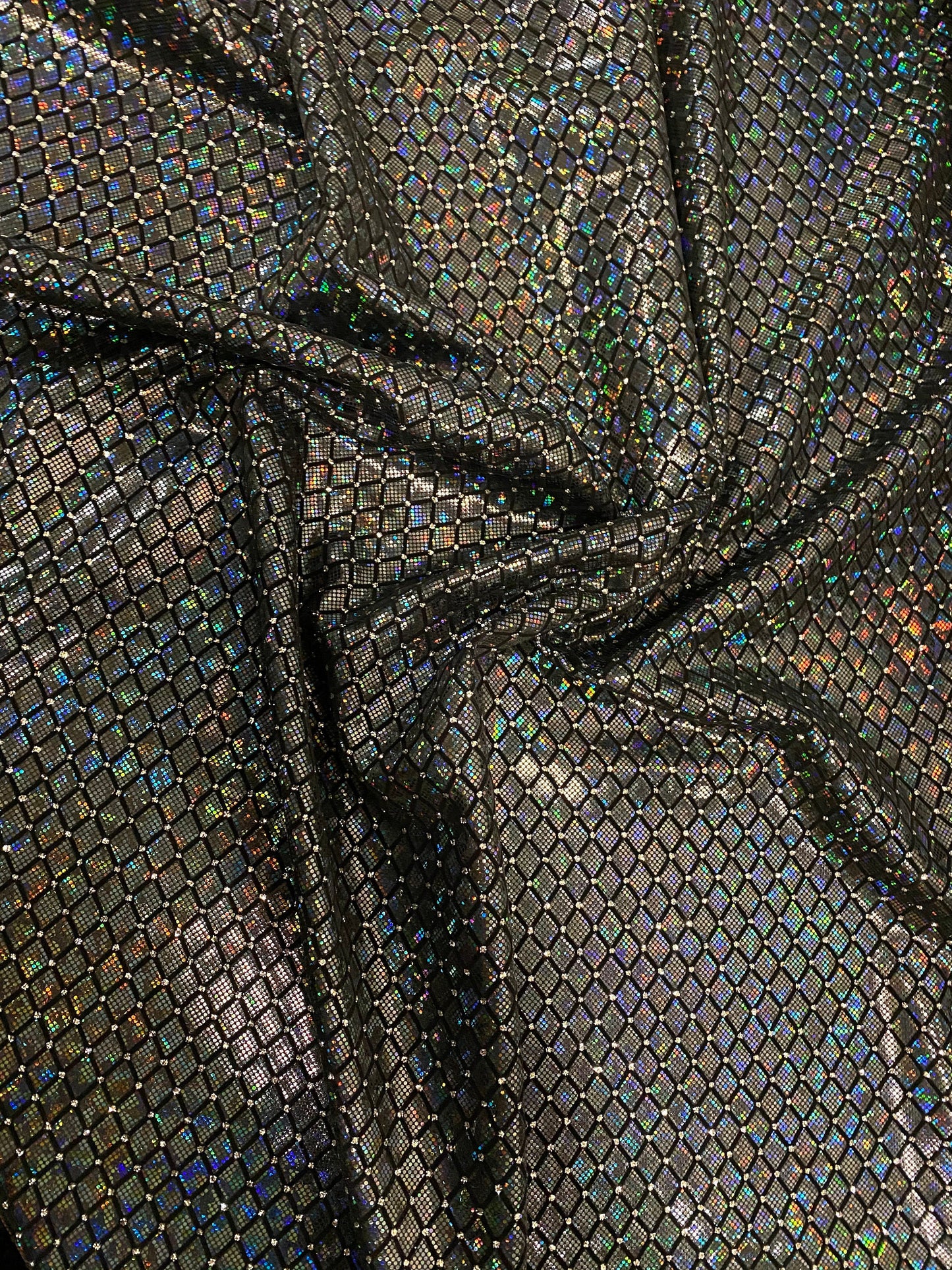 New Diamond design metallic nylon spandex shatter glass with flocking and glitter 4-way stretch 58/60” Sold by the YD. Ships from L.A CA.