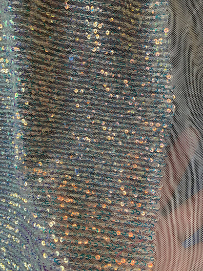 New Rose gold mini glitz Iridescent sequins on crinkle stretch mesh 2-way 58/60” Sold by the YD. Ships worldwide from Los Angeles California