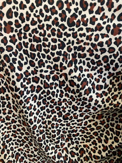 New leopard design animal print on  nylon spandex 4-way 58/60” Sold by the YD. Ships worldwide from Los Angeles California USA.