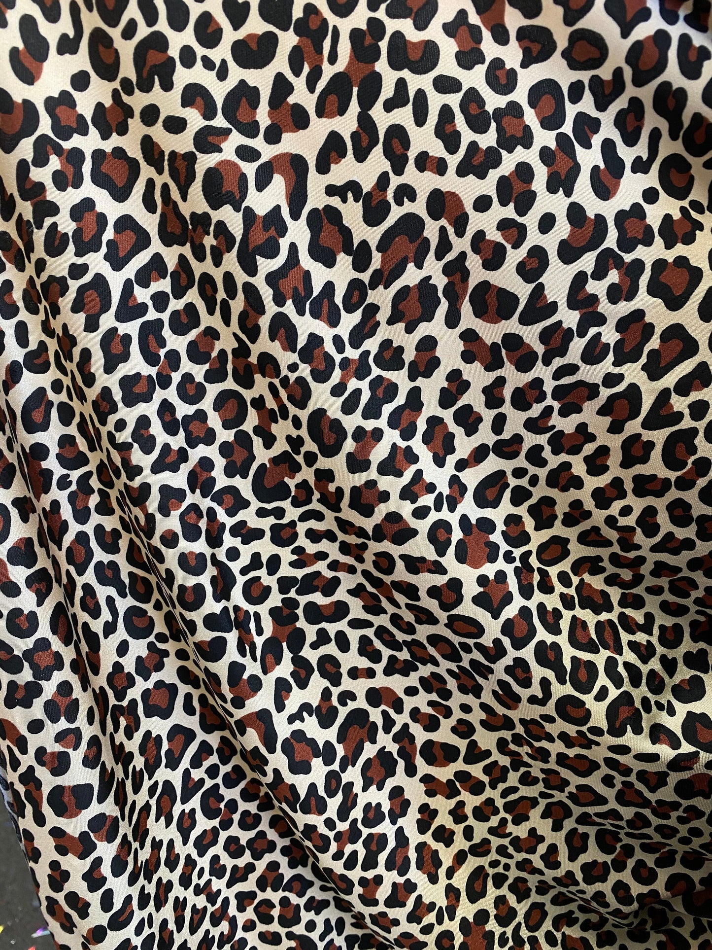 New leopard design animal print on  nylon spandex 4-way 58/60” Sold by the YD. Ships worldwide from Los Angeles California USA.