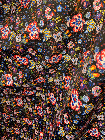 New multi flower design black/multicolor print nylon spandex 4-way stretch 58/60” Sold by the YD. Ships worldwide from Los Angeles CA USA.