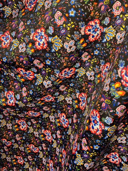 New multi flower design black/multicolor print nylon spandex 4-way stretch 58/60” Sold by the YD. Ships worldwide from Los Angeles CA USA.