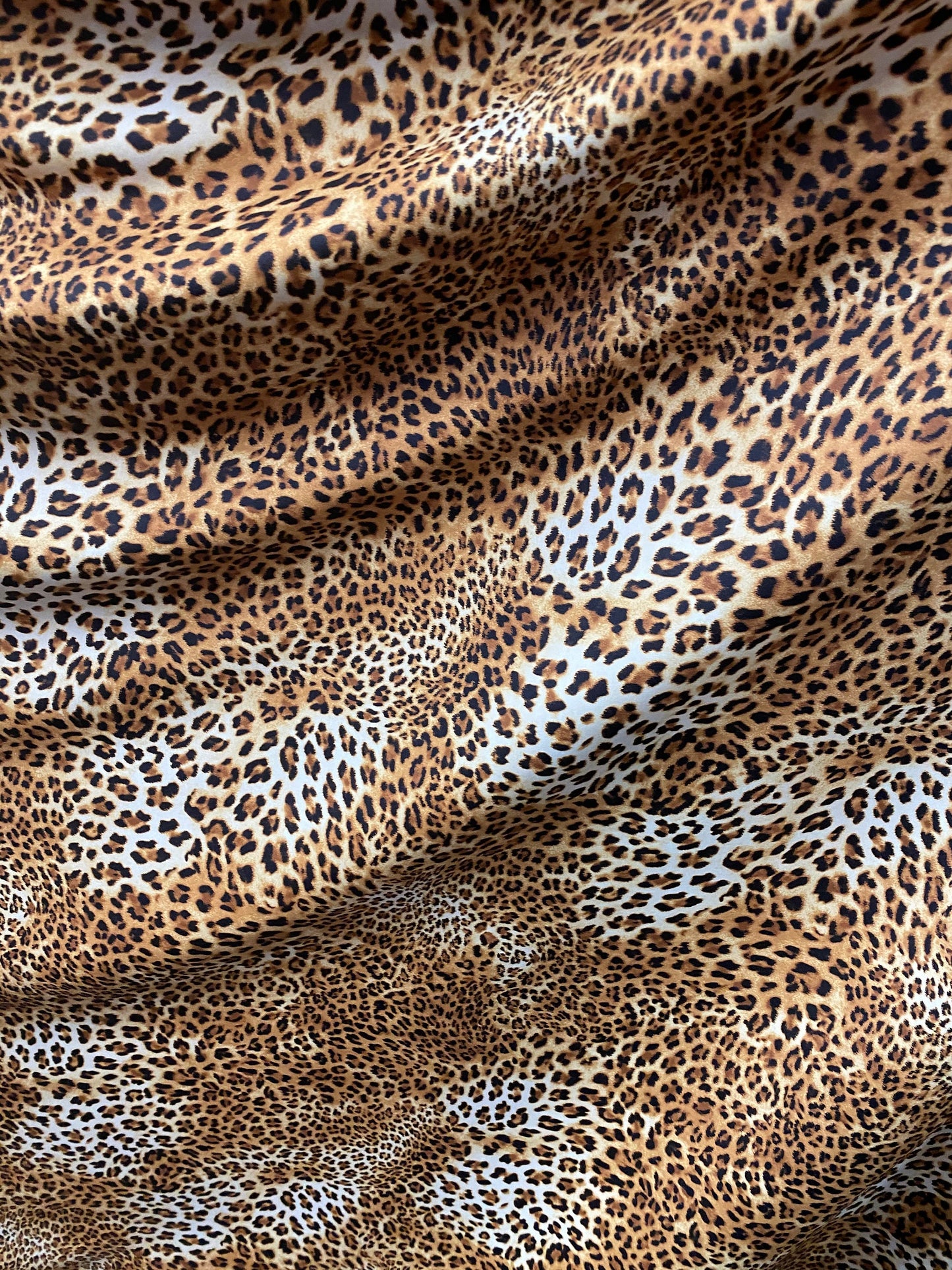 New Safari leopard design print on nylon spandex 4-way stretch 58/60” Sold by the YD. Ships worldwide from Los Angeles California USA.