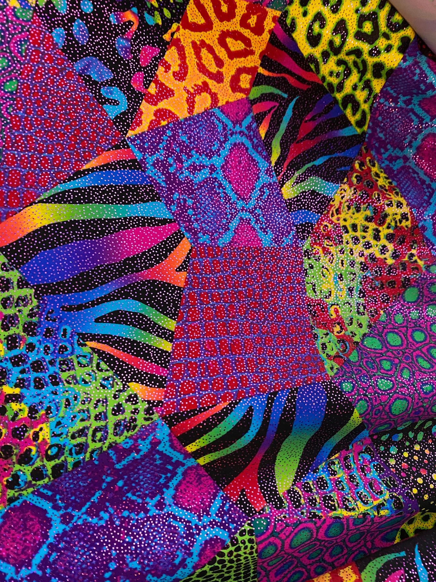 New multicolor Animal print safari design nylon spandex with metallic foil 4-way stretch 58/60” Sold by the YD. Ships worldwide from L.A CA.