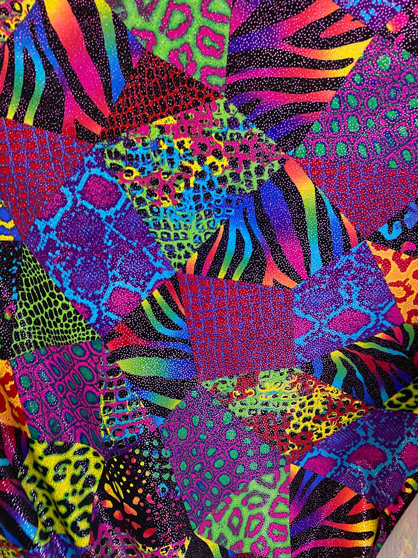 New multicolor Animal print safari design nylon spandex with metallic foil 4-way stretch 58/60” Sold by the YD. Ships worldwide from L.A CA.